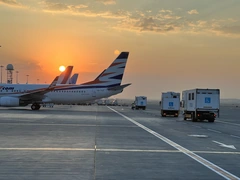 Airplanes on the apron at sunset