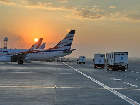 Airplanes on the apron at sunset