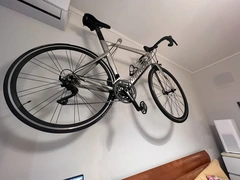 A road bicycle mounted on a wall